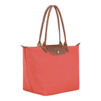 Lieblingstasche Longchamp Le Pliage large shoulder bag in coral nylon with brown leather handles and flap