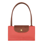 Lieblingstasche Longchamp Le Pliage shoulder bag in coral pink nylon with brown leather trim and gold snap button