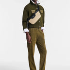 Model wearing a beige and black Longchamp Le Pliage Energy belt bag crossbody from Lieblingstasche