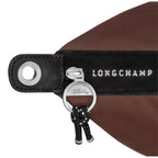 Lieblingstasche Longchamp Le Pliage Energy handbag detail featuring brown recycled nylon and black rope zipper pull
