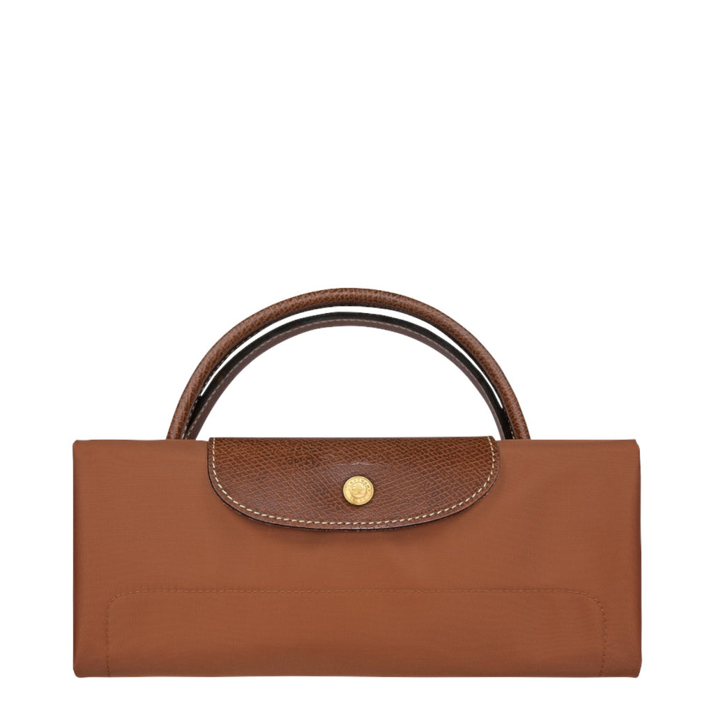 Lieblingstasche Longchamp Le Pliage travel bag folded in brown nylon with leather trim and gold snap button