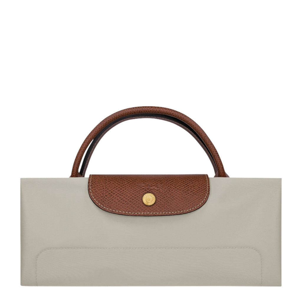 Lieblingstasche Longchamp Le Pliage XL travel bag folded in beige nylon with brown leather trim and gold hardware