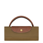 Lieblingstasche Longchamp Le Pliage travel bag folded in olive green nylon with brown leather trim and gold snap button