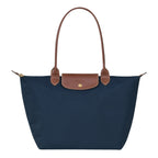 Lieblingstasche Longchamp Le Pliage large navy blue nylon shoulder bag with brown leather handles and gold hardware