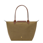 Lieblingstasche Longchamp Le Pliage medium shoulder bag in olive green nylon with brown leather handles and trim.
