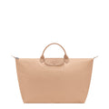 Lieblingstasche Longchamp Le Pliage One large beige travel bag with minimalist monochrome design and leather flap
