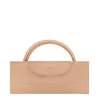 Lieblingstasche Longchamp Le Pliage One travel bag in beige, featuring a minimalist design and durable construction.