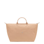 Lieblingstasche Longchamp Le Pliage One large travel bag in beige with minimalist monochrome design and top handles