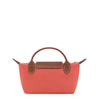 Lieblingstasche Longchamp Le Pliage Pochette in coral pink nylon with brown leather handle and flap closure