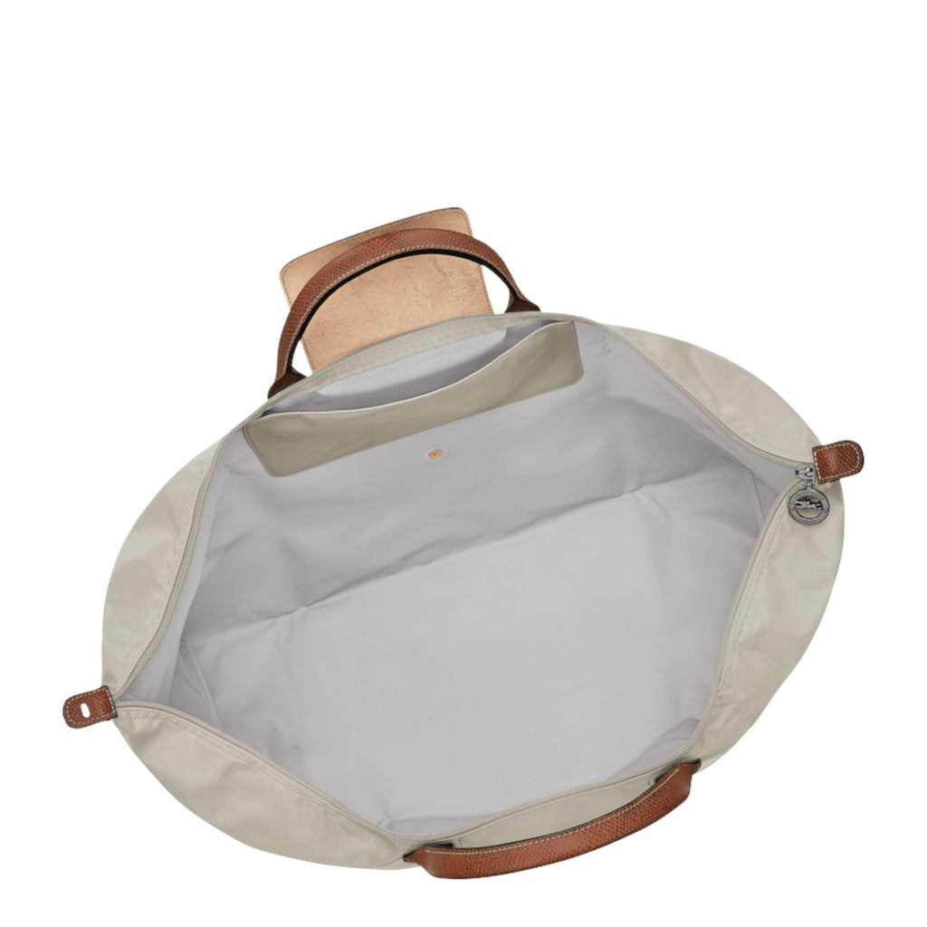 Lieblingstasche Longchamp Le Pliage XL travel bag interior view with beige nylon and brown leather handles