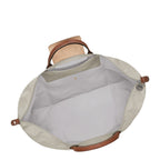 Lieblingstasche Longchamp Le Pliage XL travel bag interior view with beige nylon and brown leather handles
