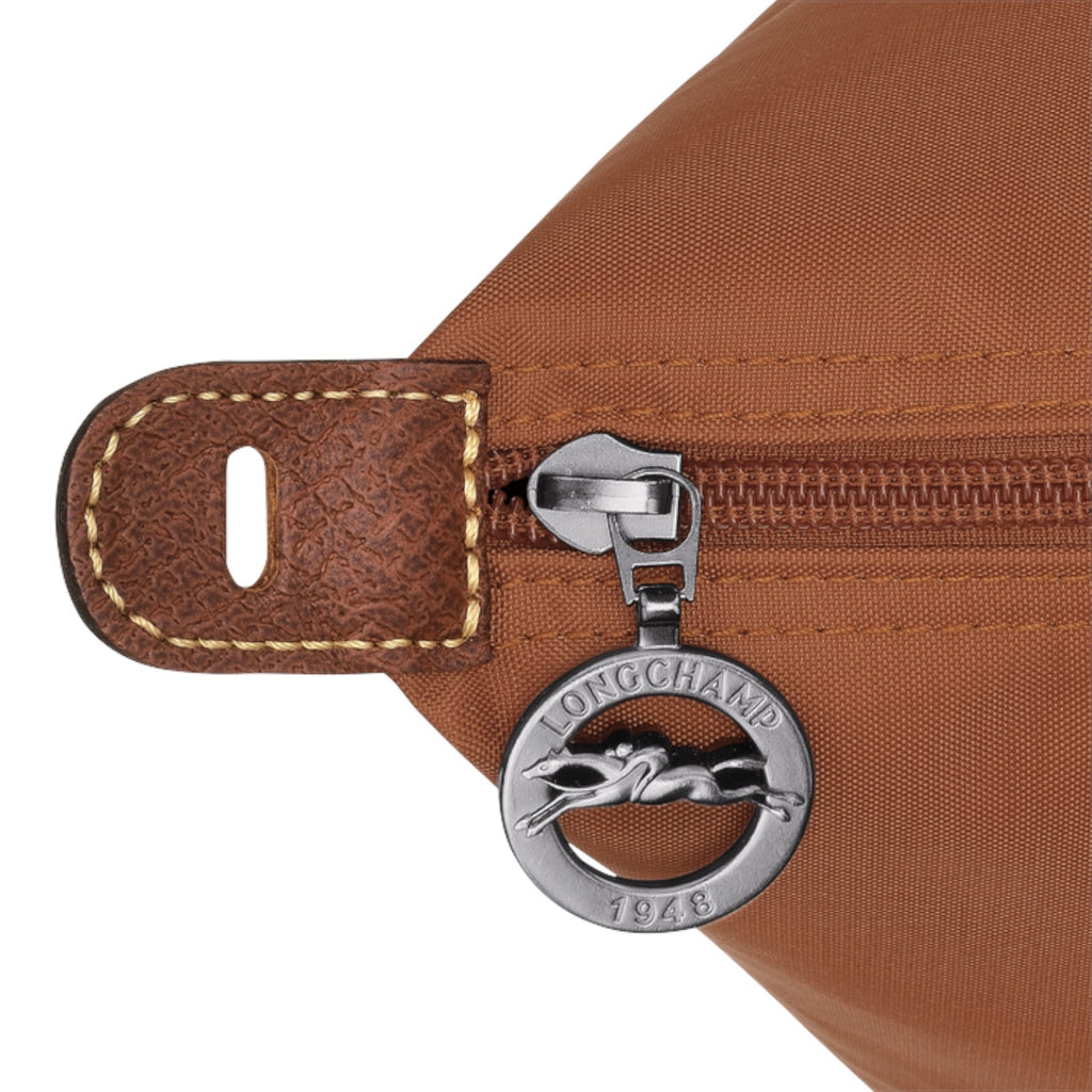 Lieblingstasche Longchamp Le Pliage travel bag brown nylon detail with silver logo zipper pull and leather tab