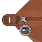 Lieblingstasche Longchamp Le Pliage travel bag brown nylon detail with silver logo zipper pull and leather tab