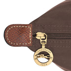 Lieblingstasche Longchamp Le Pliage handbag brown nylon with gold logo zipper pull and textured leather detail