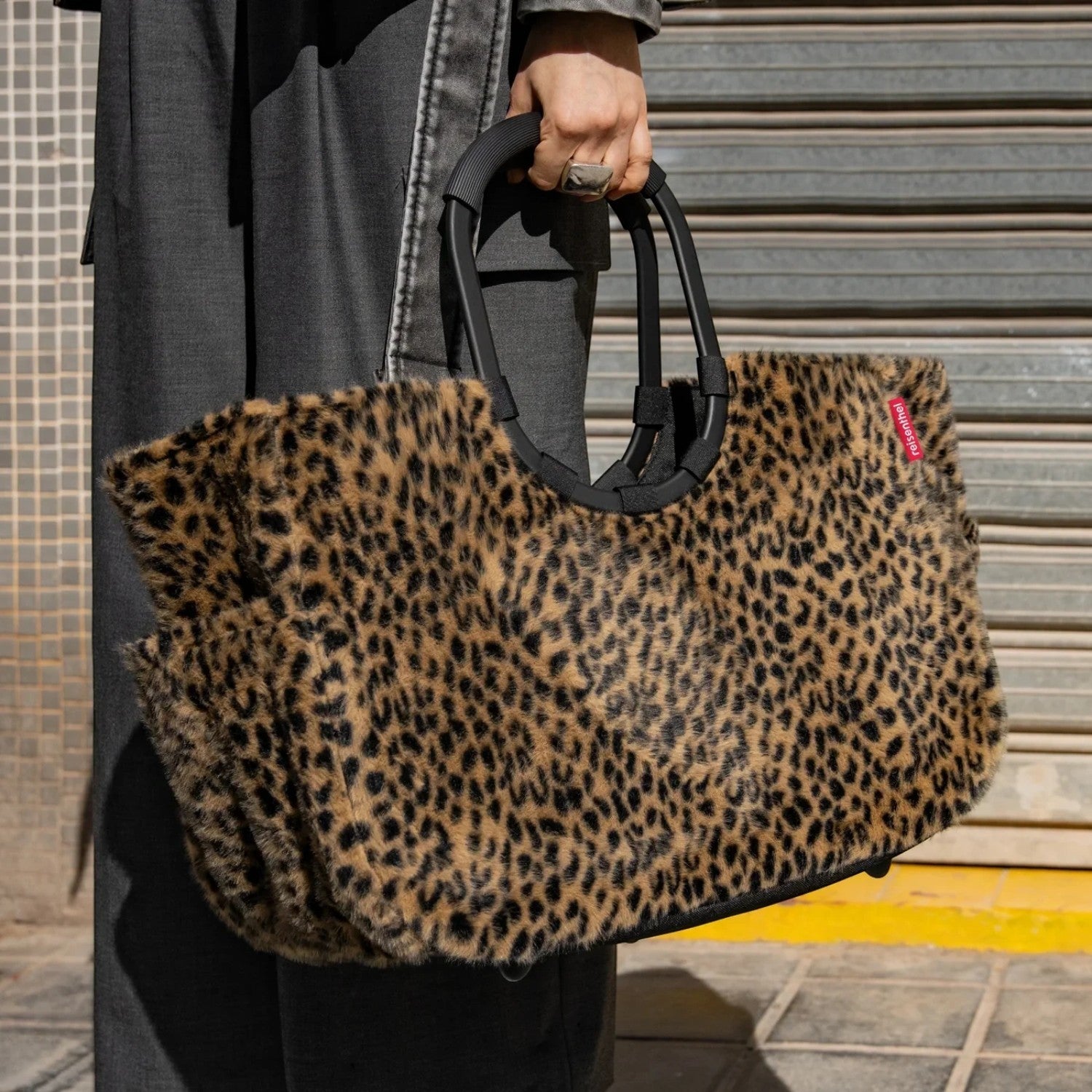 Lieblingstasche Loopshopper L tote bag in a brown and black leopard print faux fur with sturdy black handles