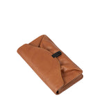 Lieblingstasche Mabel brown leather wallet with a soft ruched design and a sleek black metal clasp closure.