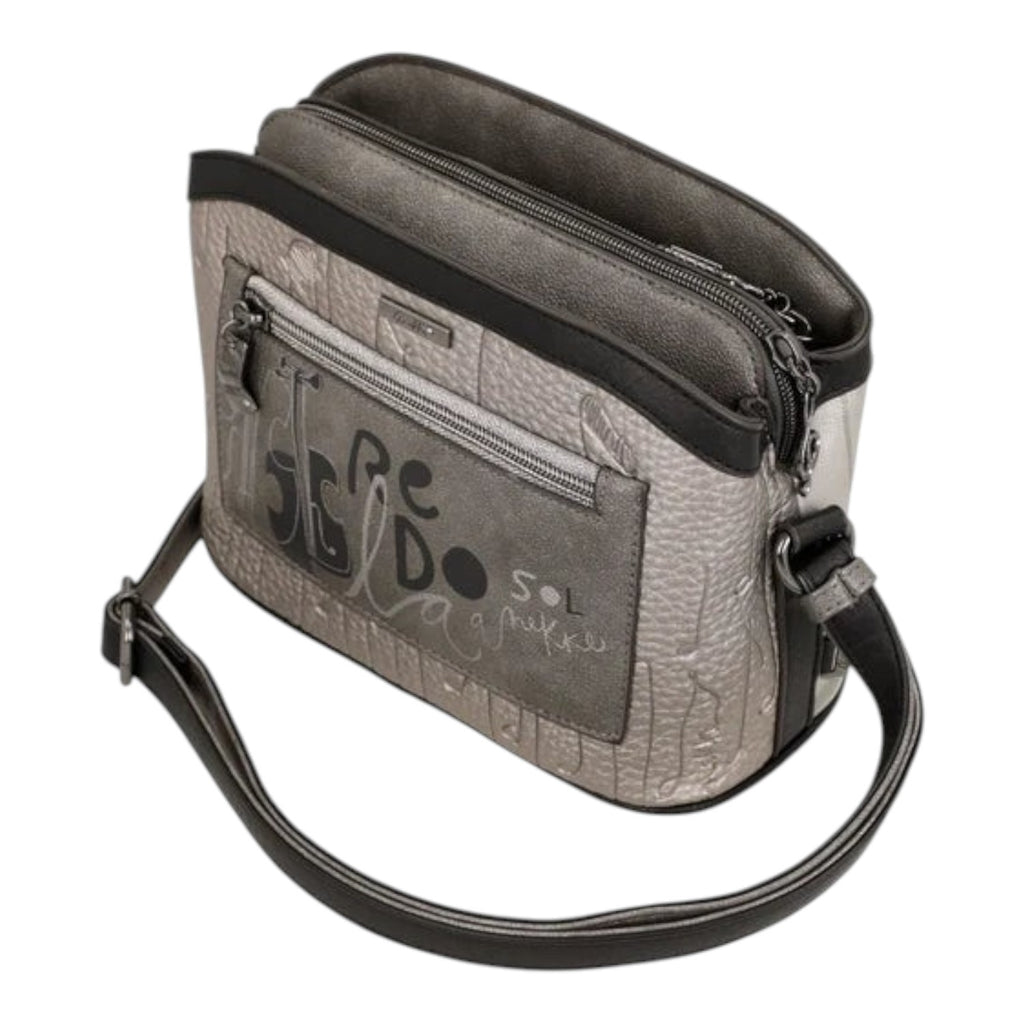 Lieblingstasche cross-body bag in metallic silver and black with textured leather finish and artistic graphic print