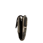 Lieblingstasche side view of a metallic grey patterned wallet with a secure zipper and snap button closure