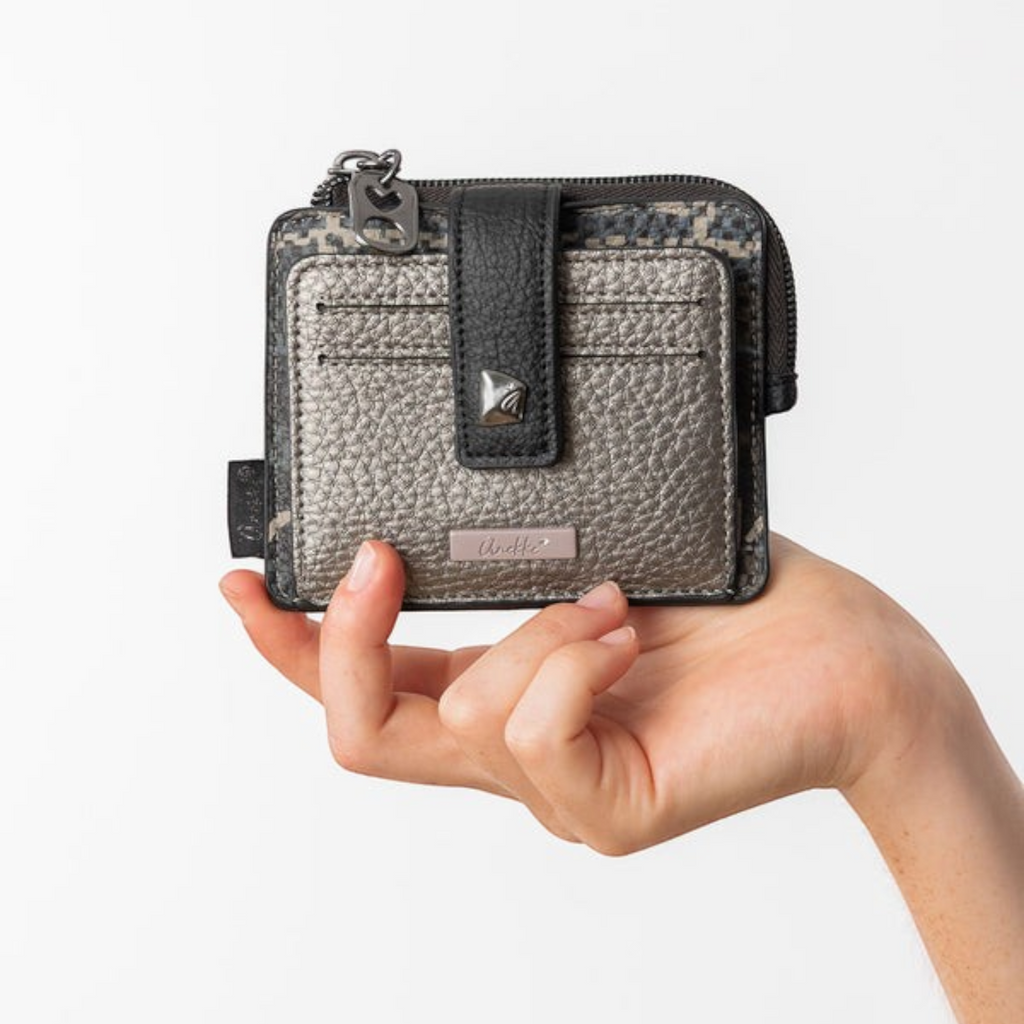 Lieblingstasche metallic silver and black textured leather purse with card slots and a snap button closure