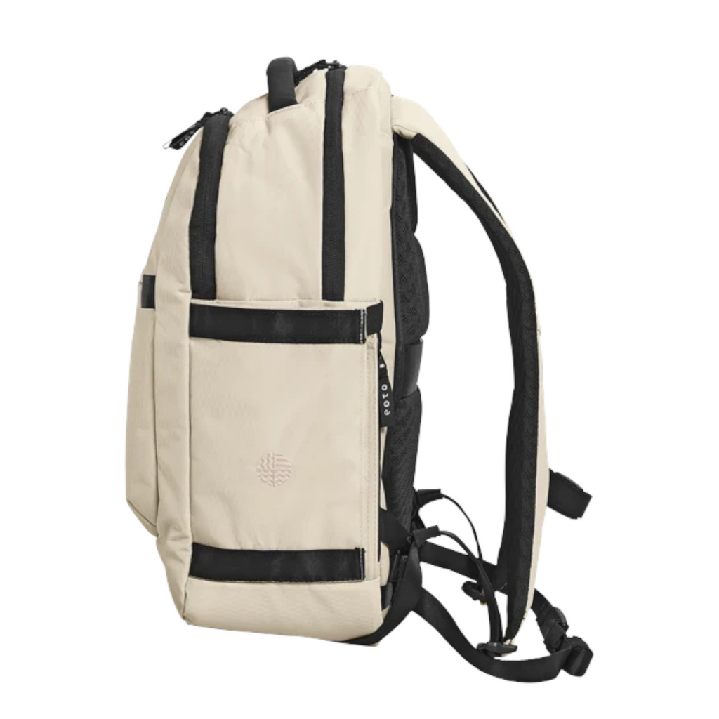 Lieblingstasche Midi20 beige city backpack with black zippers, side pockets, and padded straps on a white background