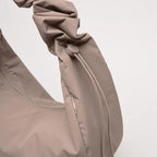 Lieblingstasche Moon Bag Ruffle Large in taupe made from recycled fishing nets with a gathered shoulder strap