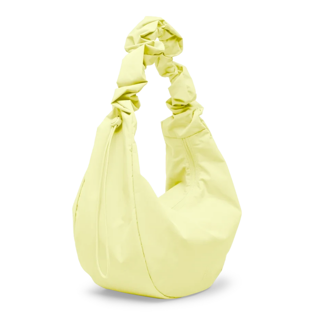 Lieblingstasche Moon Bag Ruffle Large in pale yellow with a gathered scrunchie-style handle and crescent silhouette