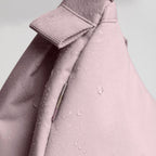 Lieblingstasche Moon Bag Small in dusty pink with water-repellent fabric texture and close-up detail of strap