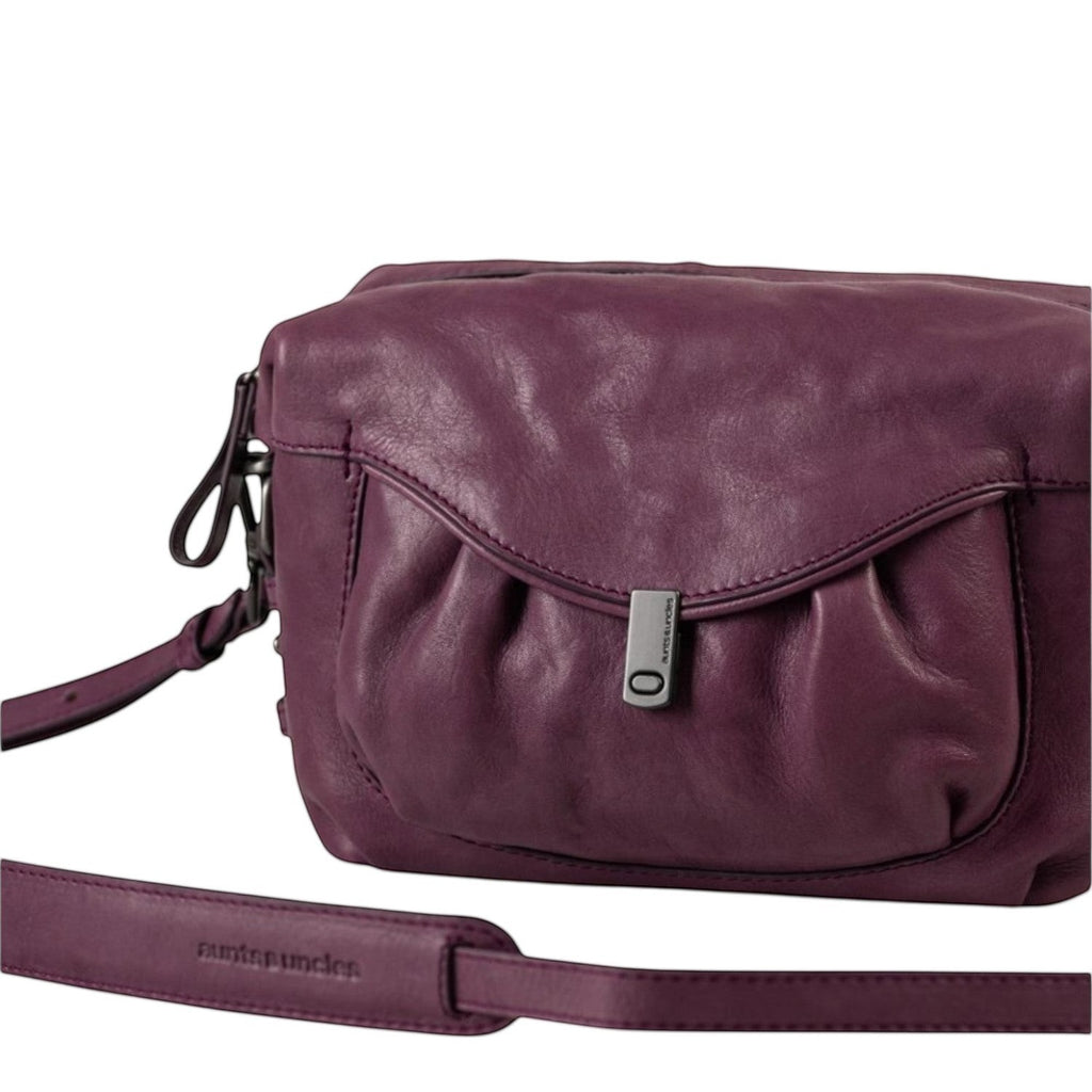 Lieblingstasche Mrs. Cannoli purple leather crossbody bag with a soft gathered front flap and metal clasp closure.