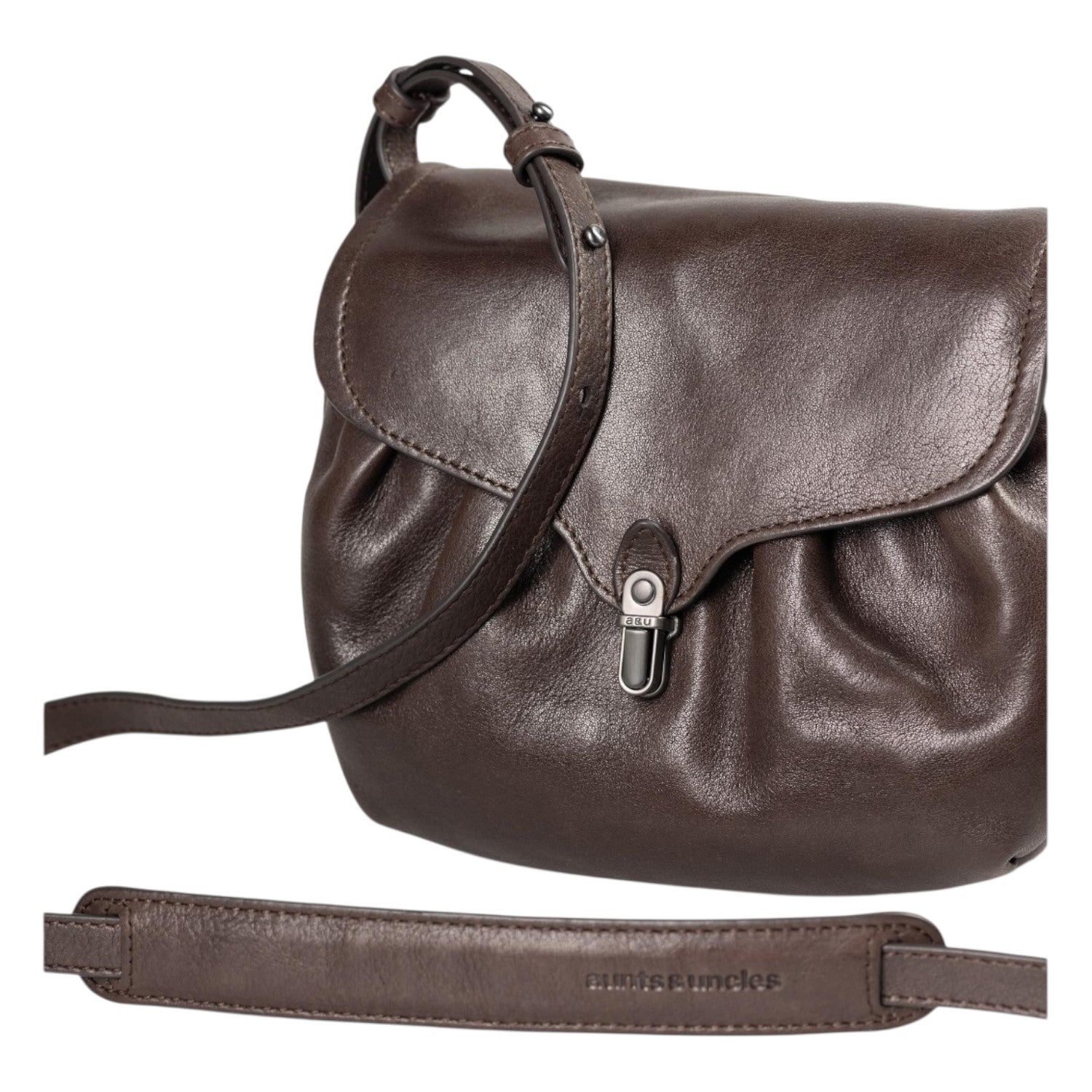 Lieblingstasche Mrs. Coconut Cake dark brown leather crossbody bag with a flap closure and adjustable shoulder strap.