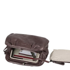 Lieblingstasche Mrs. Frosting dark brown leather clutch bag with a metal kiss-lock clasp and interior lining.