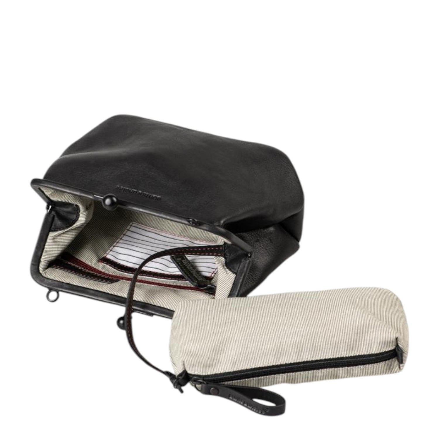 Lieblingstasche Mrs. Pizzelle black leather handbag with a kiss-lock closure and a matching striped inner pouch.