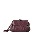 Lieblingstasche Mrs. Whoopie Pie dark purple leather crossbody bag with a vintage-style kiss-lock clasp closure.