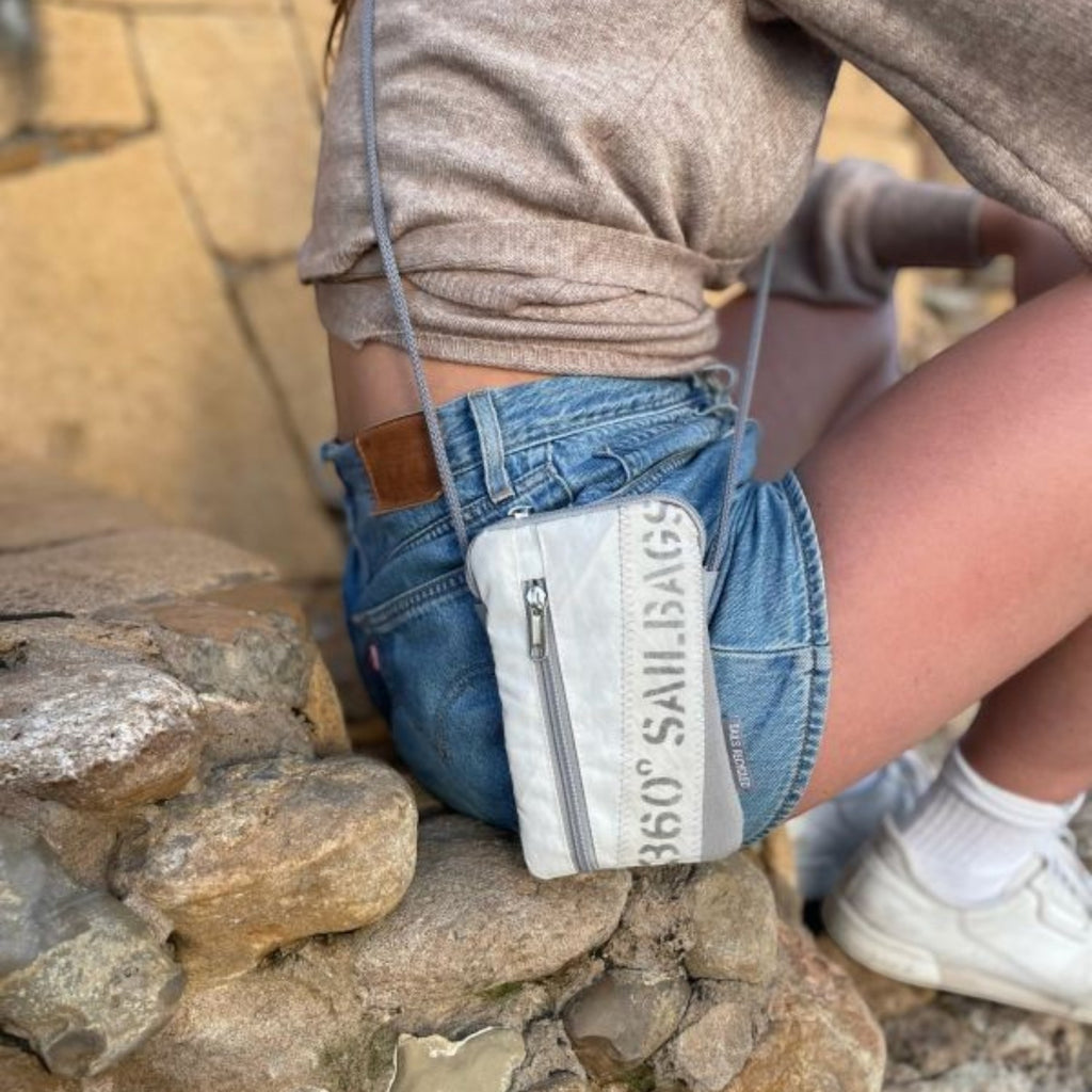 Lieblingstasche Nautik Lütt crossbody phone bag made from white recycled sailcloth with grey trim and sail stitching