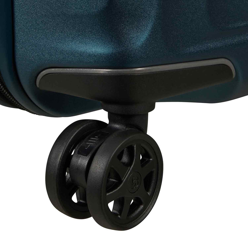 Lieblingstasche NUON Spinner 55/20 Exp suitcase featuring a durable dark teal hardshell and smooth rolling double wheels.