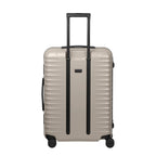 Lieblingstasche OVERSEAS 4w Trolley M+ in beige with a hard shell, telescopic handle, and four spinner wheels.