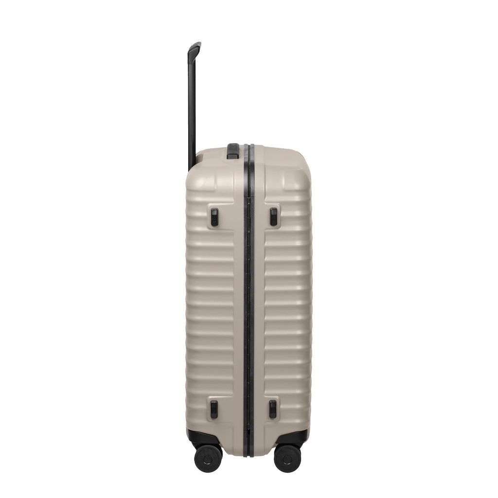 Lieblingstasche OVERSEAS 4w Trolley M+ in beige with a ribbed hard shell and black telescopic handle
