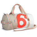 Lieblingstasche Pirat duffel bag made from recycled sailcloth with a white and beige design and orange number 6