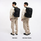 Lieblingstasche Pro Pack black laptop backpack with mesh side pocket and water bottle worn by a man on white background