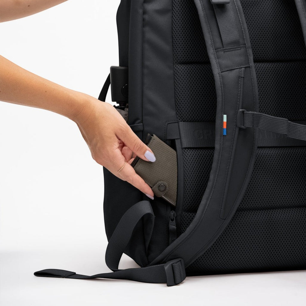 Lieblingstasche Pro Pack Travel black backpack made from recycled plastic with a side pocket for small items