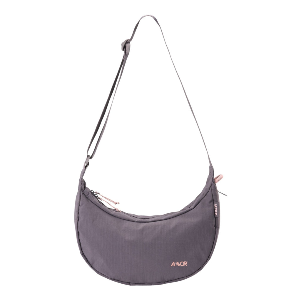 Lieblingstasche purple crescent-shaped sling bag with adjustable strap and zipper details