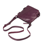 Lieblingstasche Mrs. Chocolate Cookie crossbody bag in deep purple leather with an adjustable shoulder strap