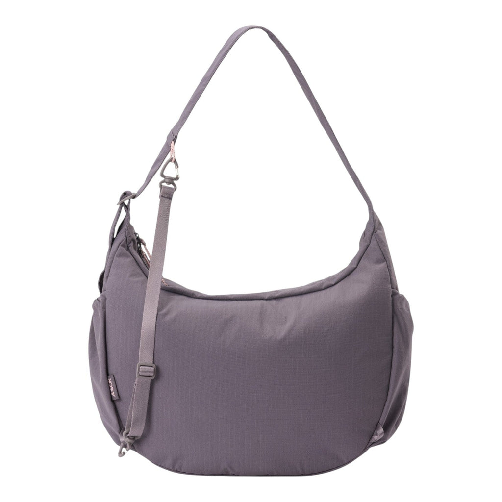 Lieblingstasche slouchy hobo bag in muted purple nylon with an adjustable shoulder strap and side pockets.