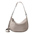 Lieblingstasche Raven taupe leather hobo bag with a shoulder strap and dark metal hardware details