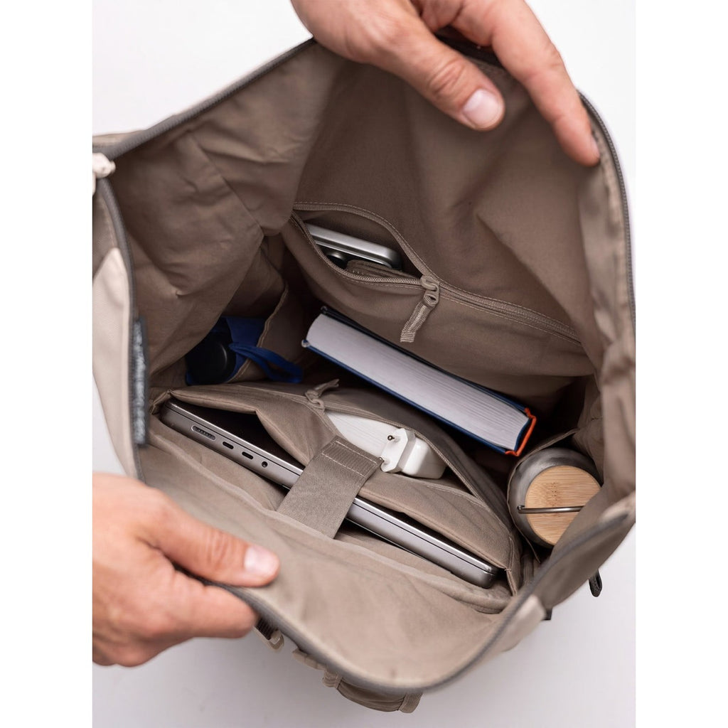 Lieblingstasche Rolltop Adventure backpack interior with laptop, book, phone, water bottle, and charger