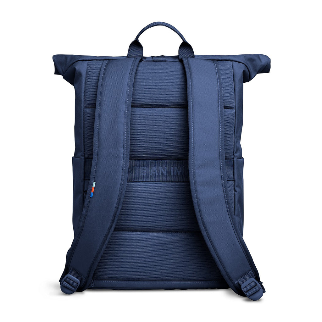 Lieblingstasche Rolltop Easy backpack in navy blue canvas with padded straps and a small flag detail.