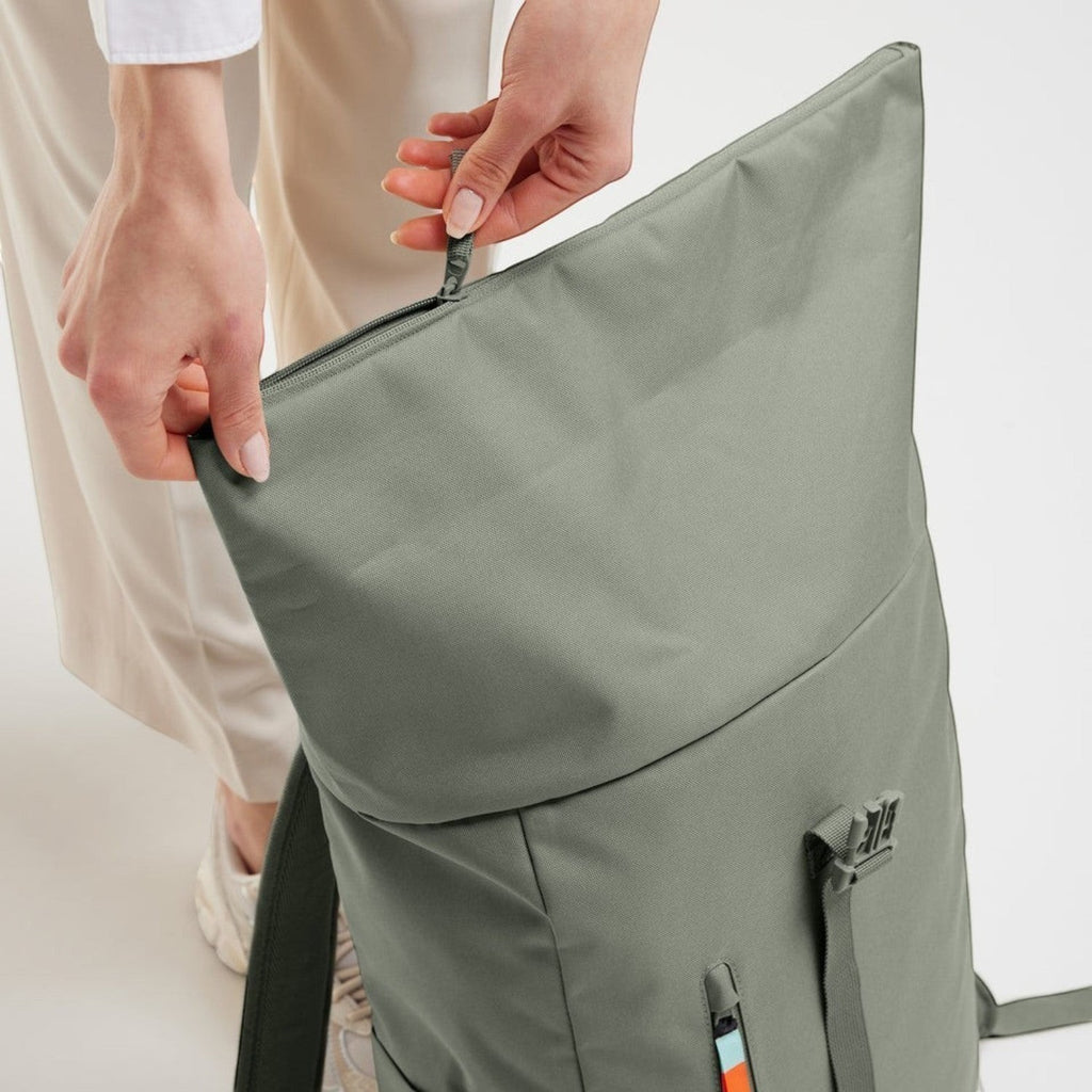 Lieblingstasche Rolltop Easy backpack in sage green with a soft, flexible design and secure zipper closure.