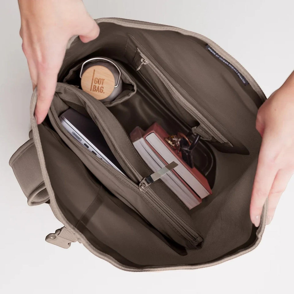 Lieblingstasche GOT BAG Rolltop Lite 2.0 backpack interior showing laptop sleeve, water bottle, and organized pockets