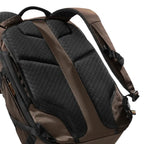 Lieblingstasche Rolly32 brown backpack showing breathable mesh back padding, ergonomic shoulder straps, and trolley loop