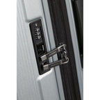 Lieblingstasche Samsonite Nuon spinner suitcase featuring a grey hardshell exterior and integrated TSA lock detail