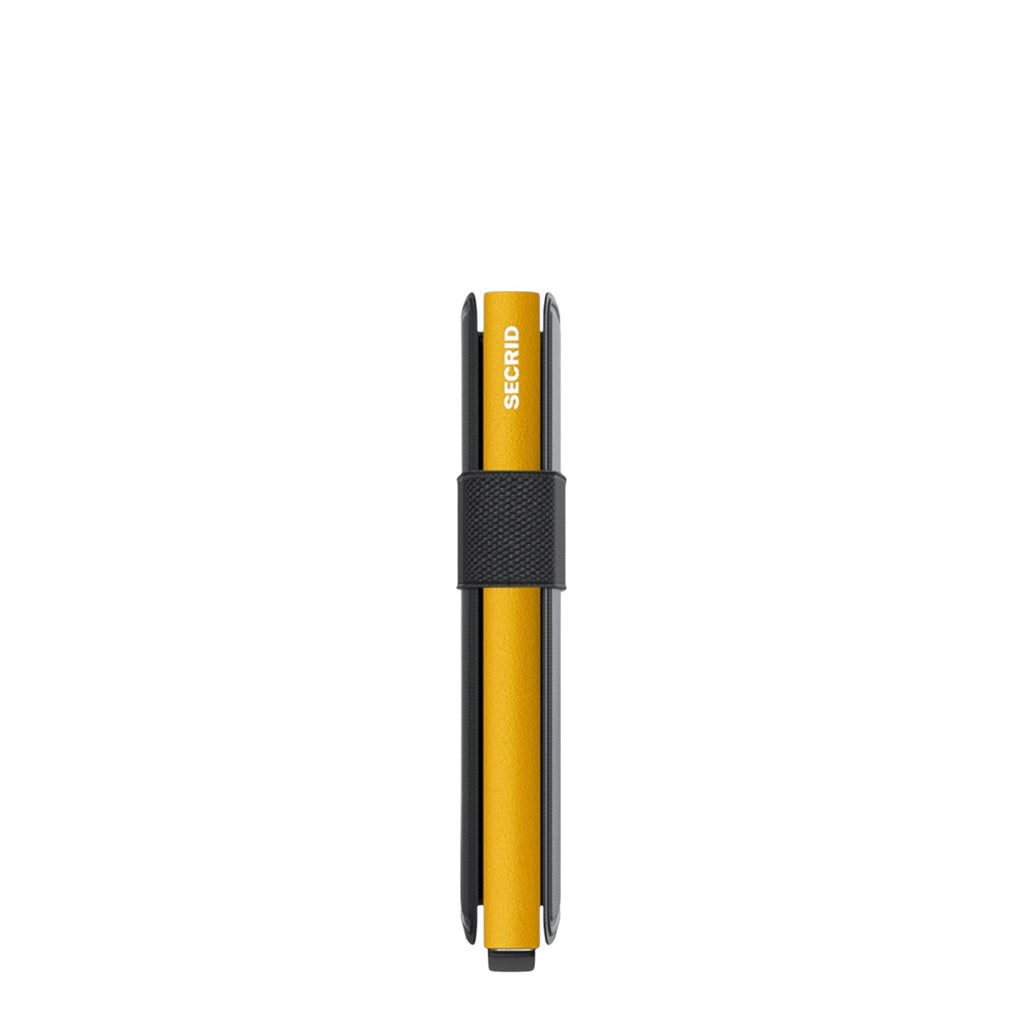 Lieblingstasche Secrid Bandwallet TPU in yellow with a black elastic band and integrated RFID card protector
